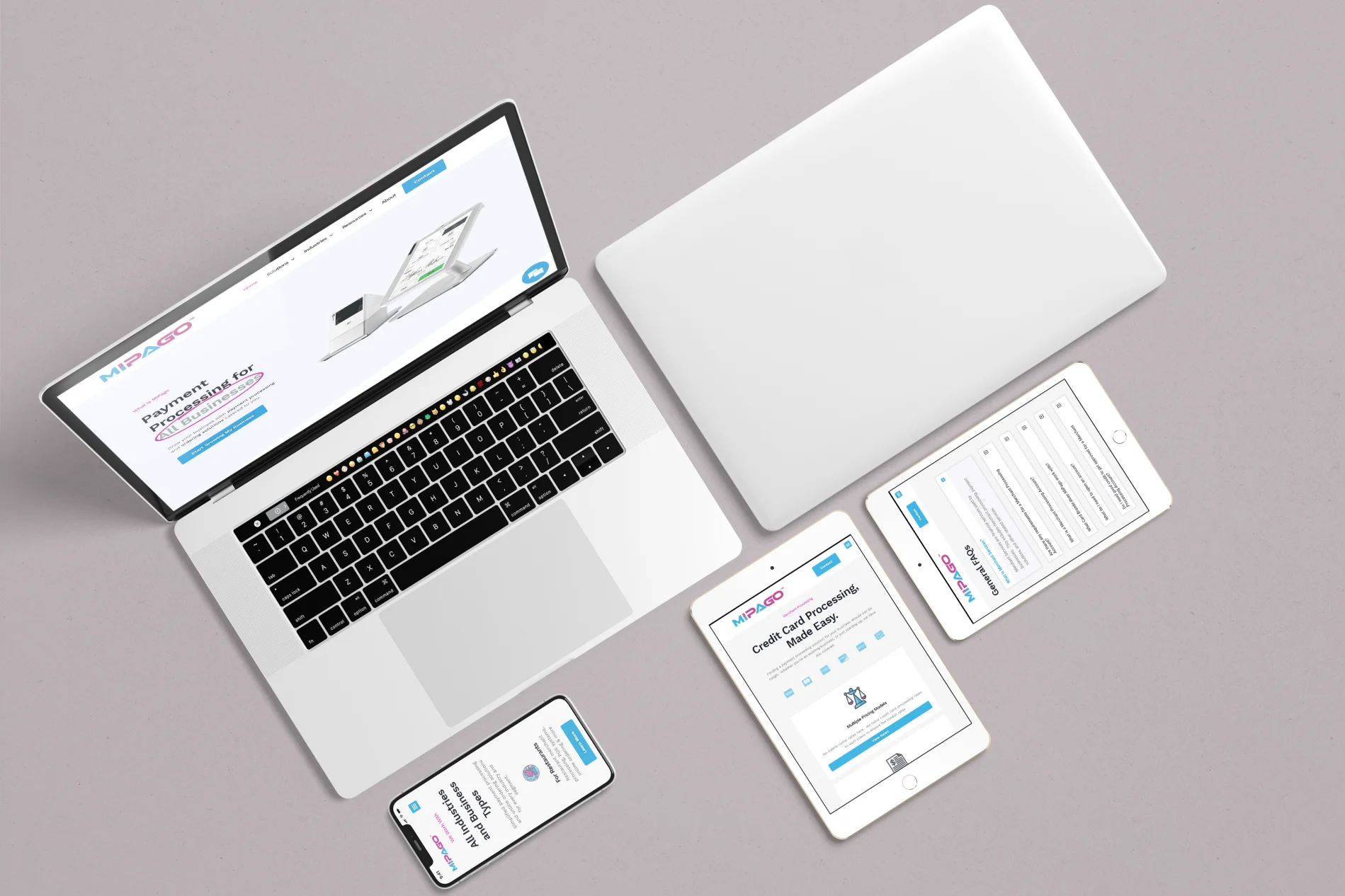 Website for a merchant processing company displayed on multiple size devices